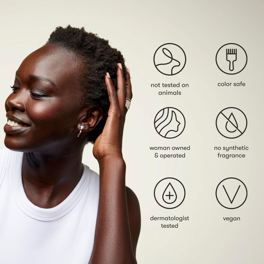 Odele Clarifying Shampoo bottle with cucumber slice hints natural fragrance and freshness