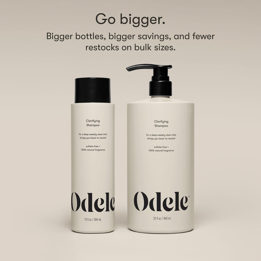 Creamy texture of Odele Clarifying Shampoo prepared for a weekly cleanse.