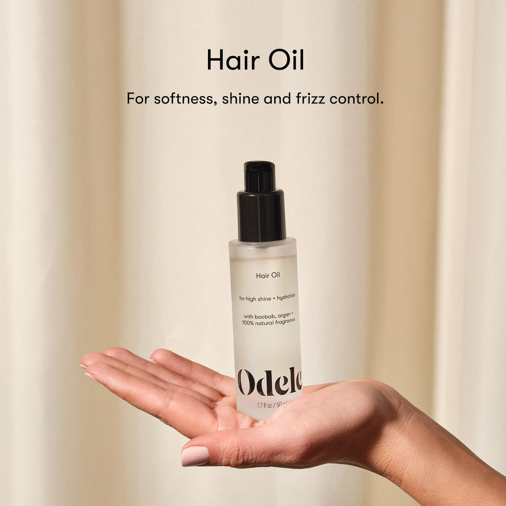 Close-up of glossy hair after Odele oil showcasing shine and smoothness