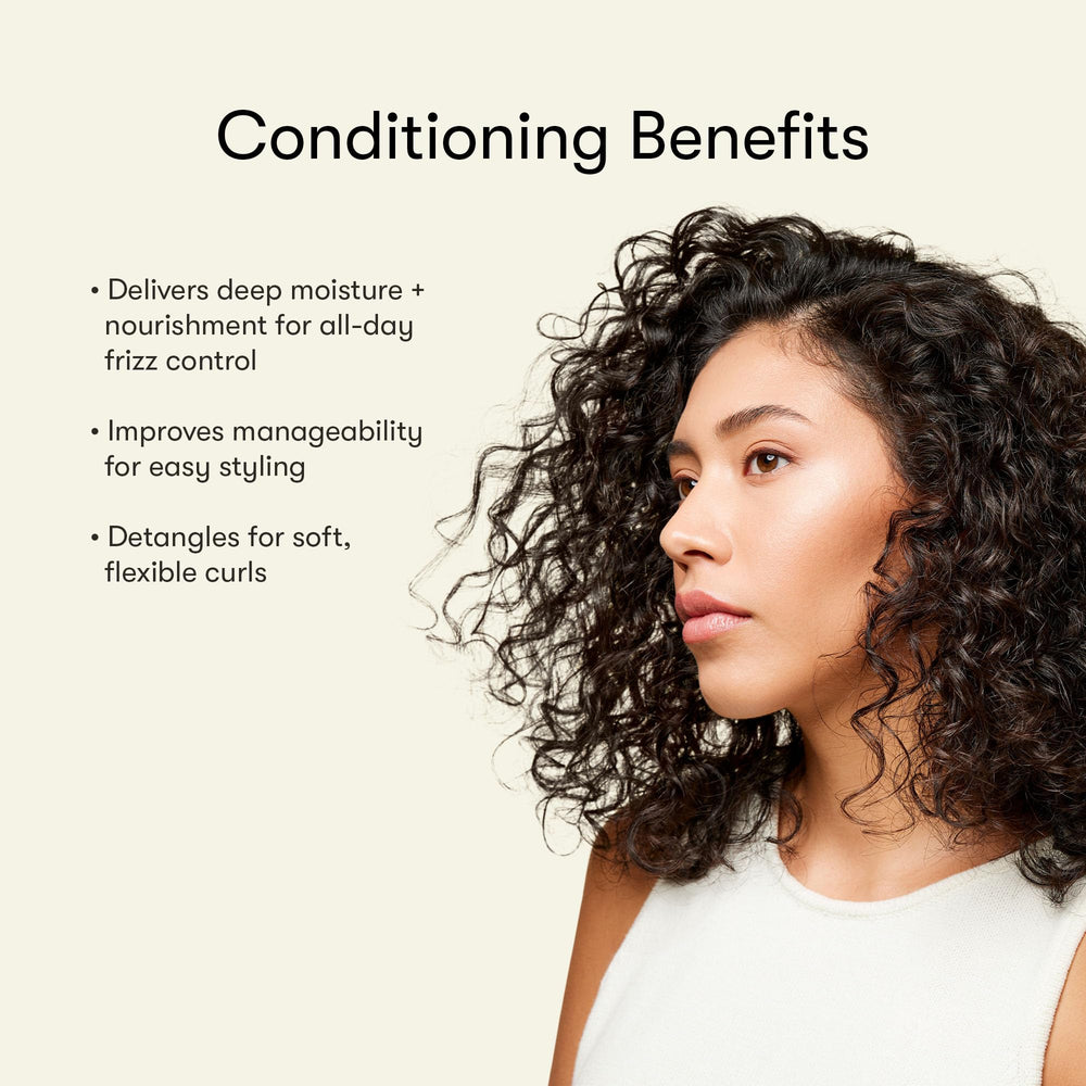 Odele Leave-In Conditioner applying to towel-dried hair demonstrates detangling ease.