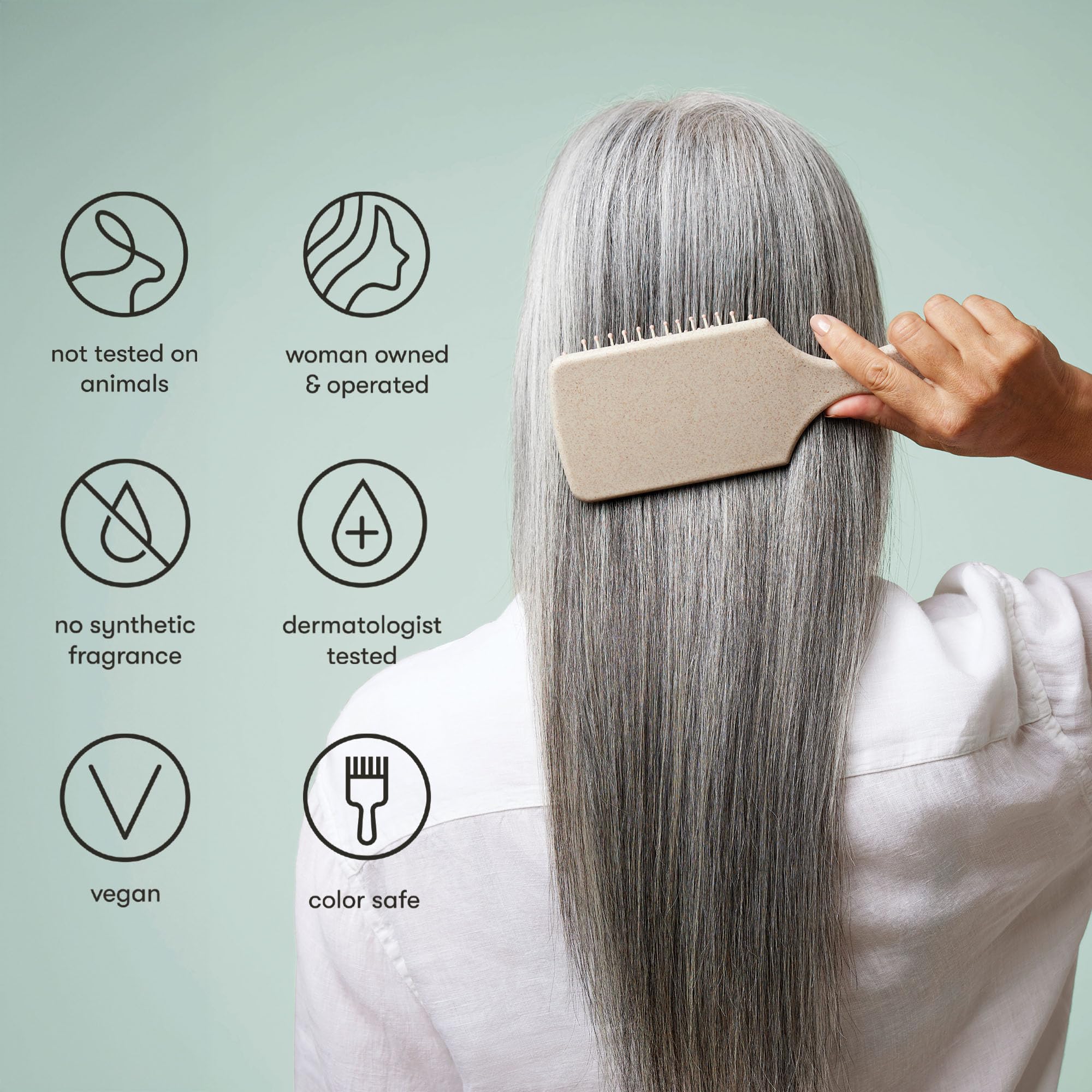 Odele Smoothing Conditioner being applied to hair for detangling ease