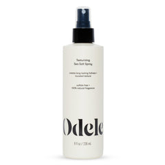 Odele Texturizing Sea Salt Spray bottle front showing voluminous, textured hair possibilities.