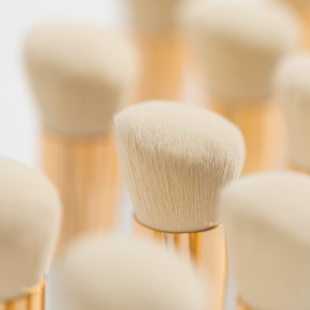 Ogee Blender Brush easy-clean synthetic bristles for hygienic routines.