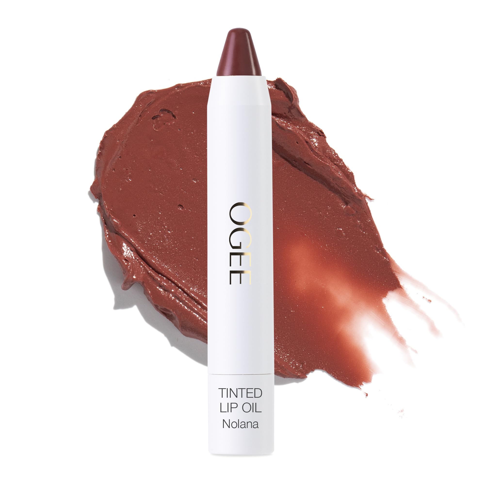 Ogee Nolana lip oil terracotta-swirl showcases buildable color and conditioning shine.