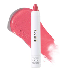 Ogee lip oil Camellia front view with sheer pink tint and nourishing shine.