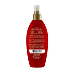 OGX Miracle Gloss Spray dispensing nozzle for quick smoothing on damp hair