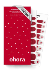 ohora n cupid's heart nail strips closeup showing red glitter for salon-like shine