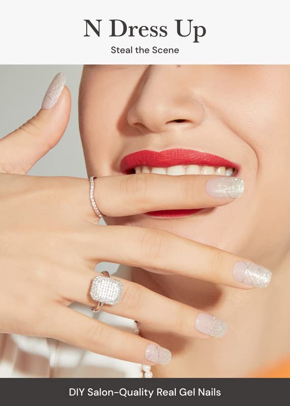ohora N Dress Up patterned strip application closeup demonstrates quick, easy DIY manicure.