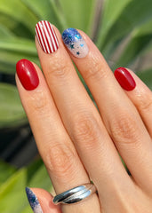 ohora N Spangled Burst wraps on nails with glittery finish for a bold manicure