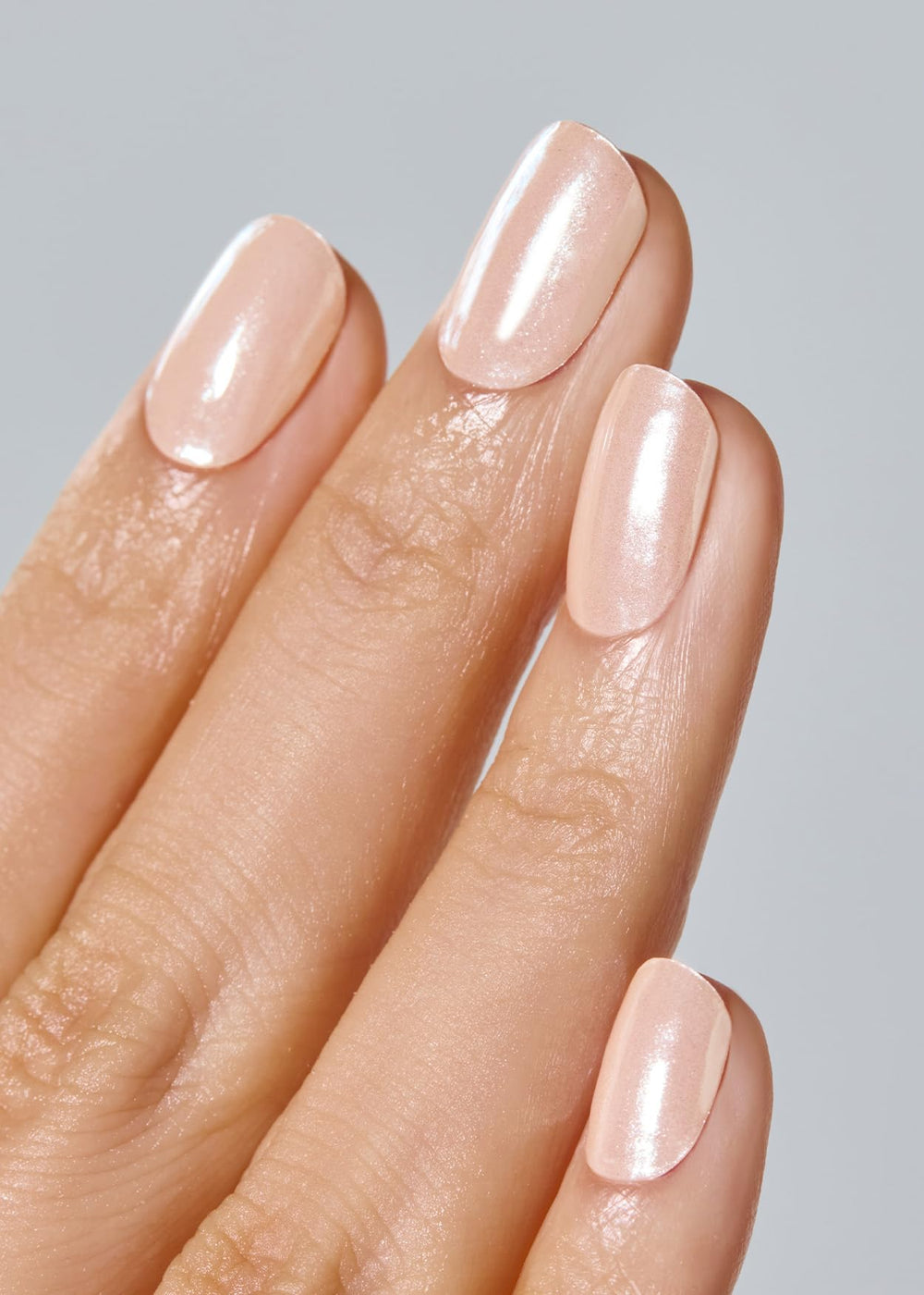 ohora Vanilla Chrome semi-cured gel nails being applied with any lamp for fast cure