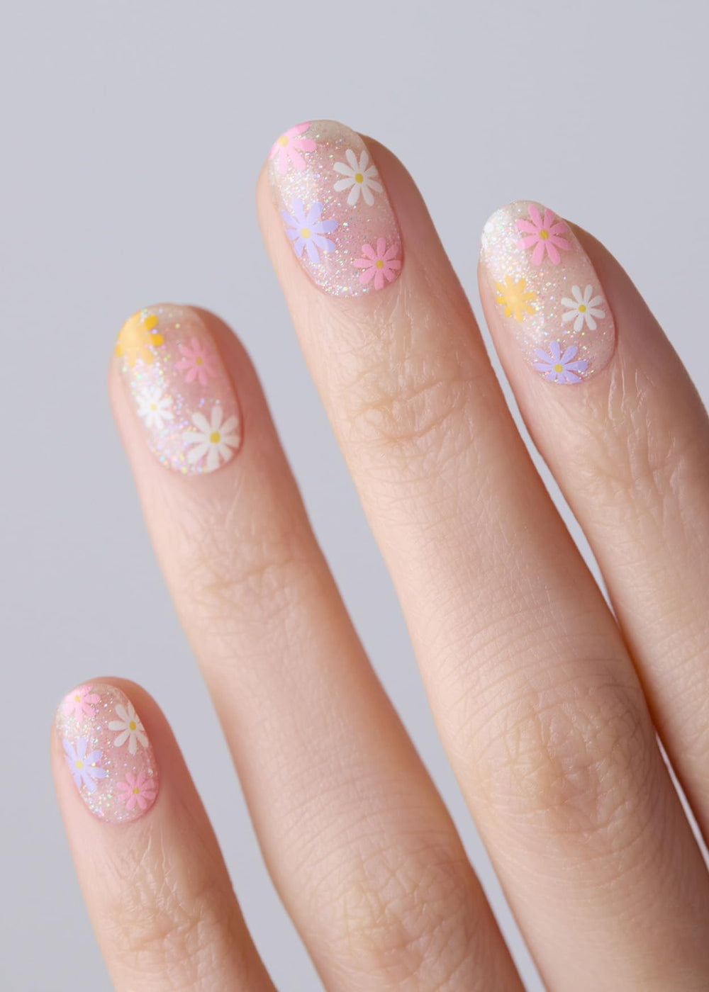 ohora Daisy Disco nail strips showcasing rainbow accents for chic nails
