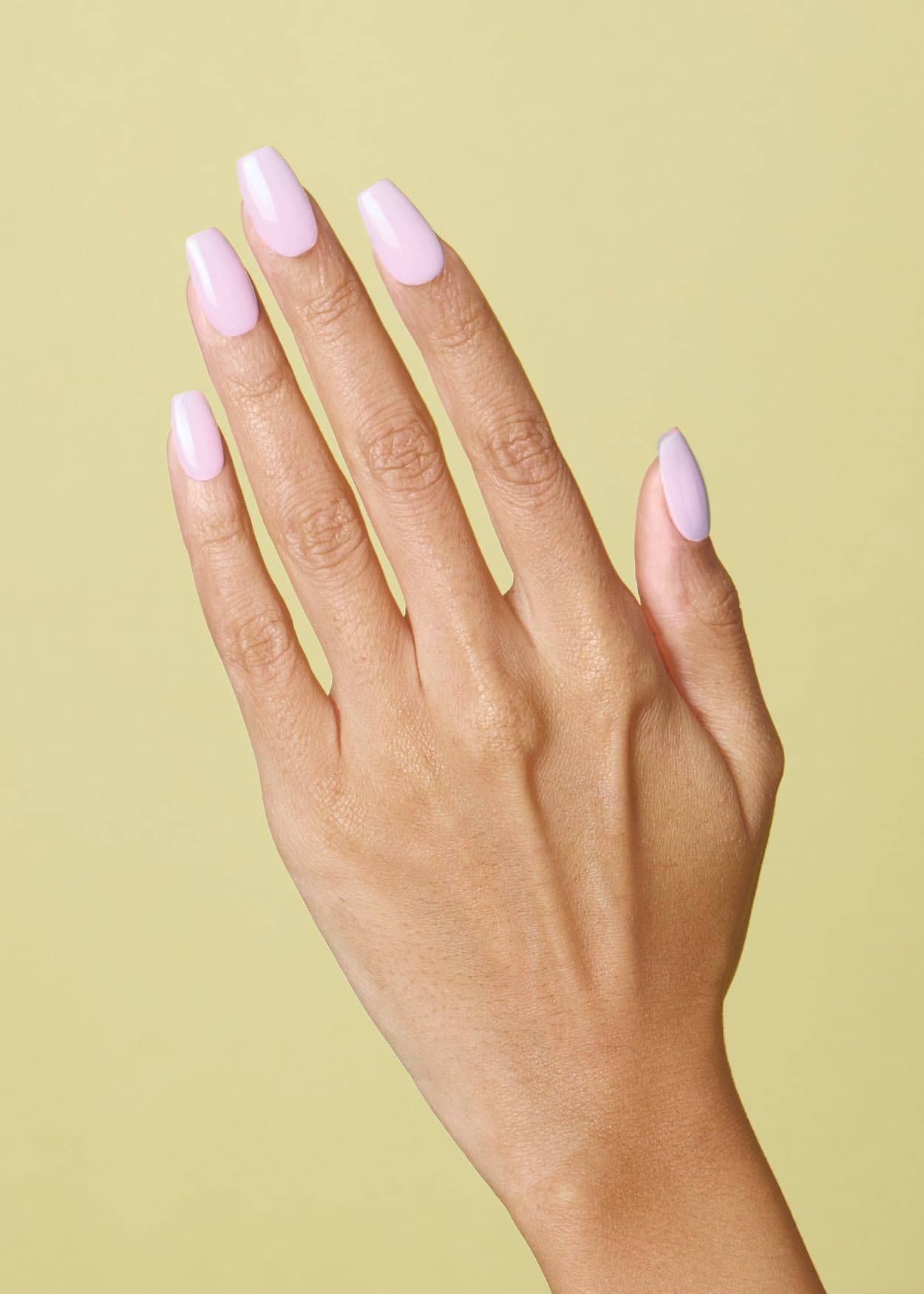 ohora semi-cured nail strips hands close-up ready for easy at-home application.
