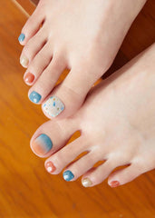 ohora pedi strips closeup blue orange pattern for easy at-home manicure