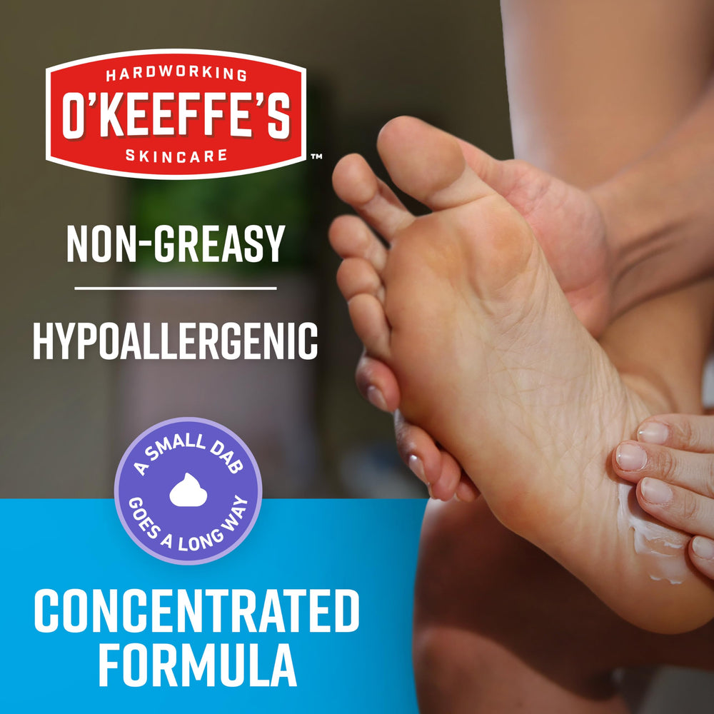 Massaging O'Keeffe's Night Treatment into feet for soothing moisture.