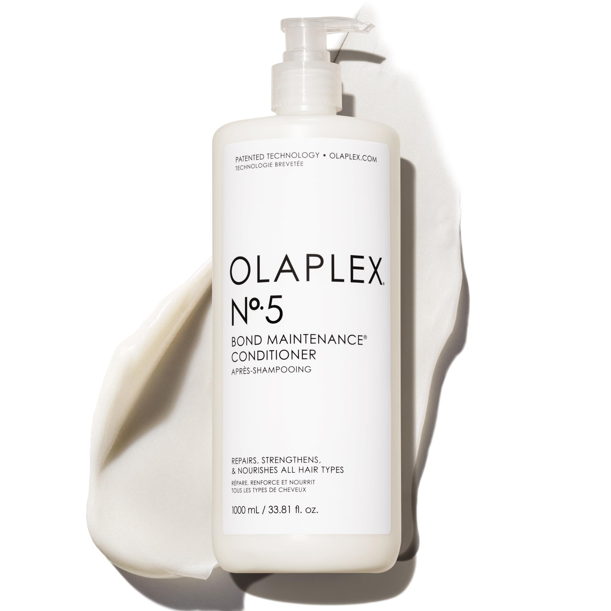 Olaplex Nº.5 conditioner bottle close-up showing smoothing formula for damaged hair