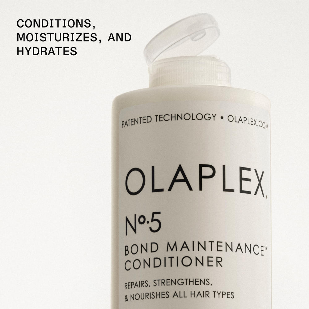 Olaplex Nº5 bottle shown with hair shine on a styled strand.