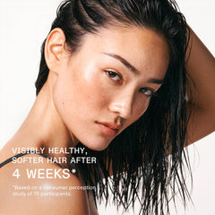 Olaplex No. 0.5 applied to scalp for soothing relief.