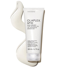 Olaplex No.10 bottle closeup demonstrates humidity resistance for defined curls.