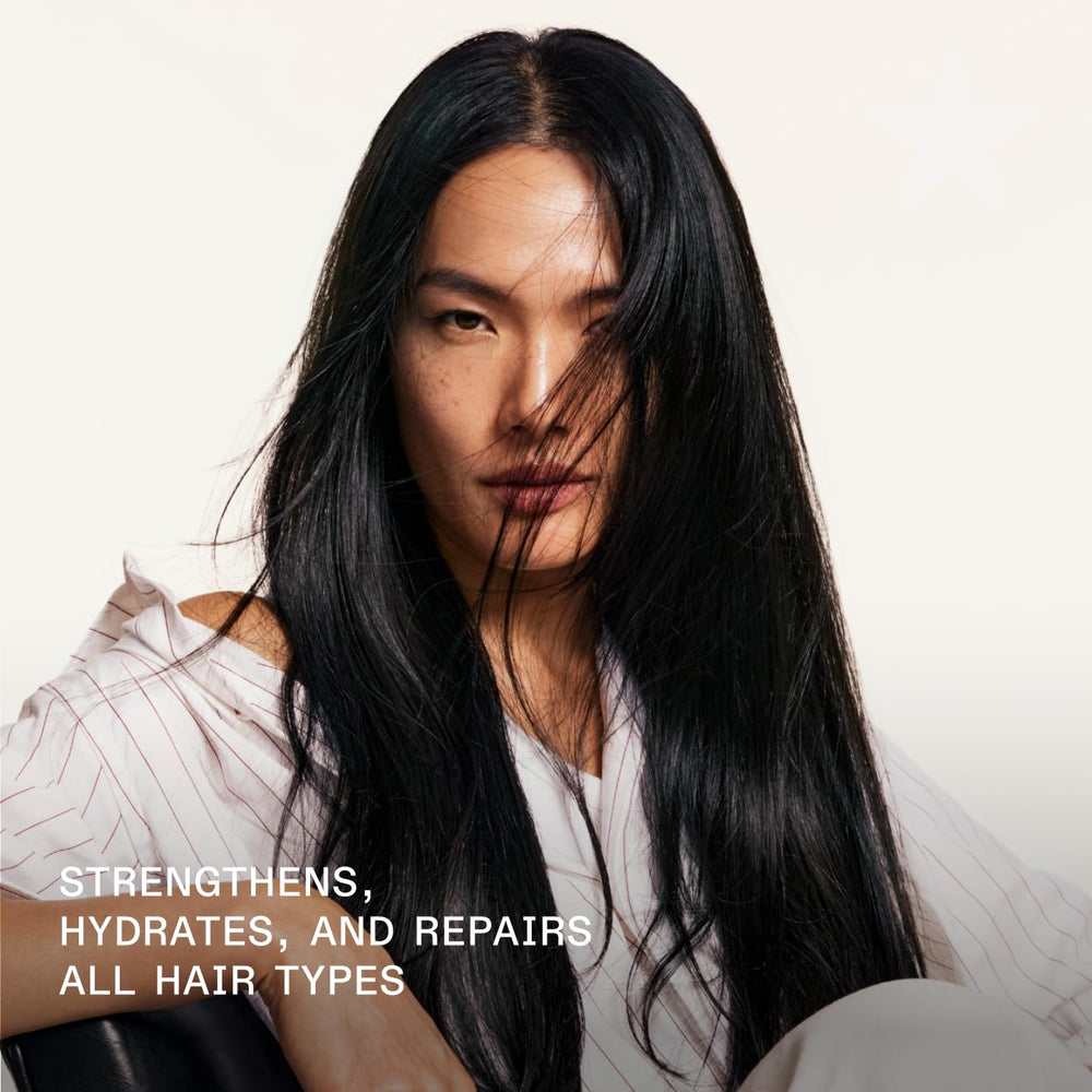 Olaplex No.4 shampoo lather close-up demonstrates cleansing action.