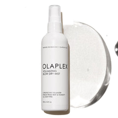 Olaplex Volumizing Blow Dry Mist bottle pour for weightless volume and shine.