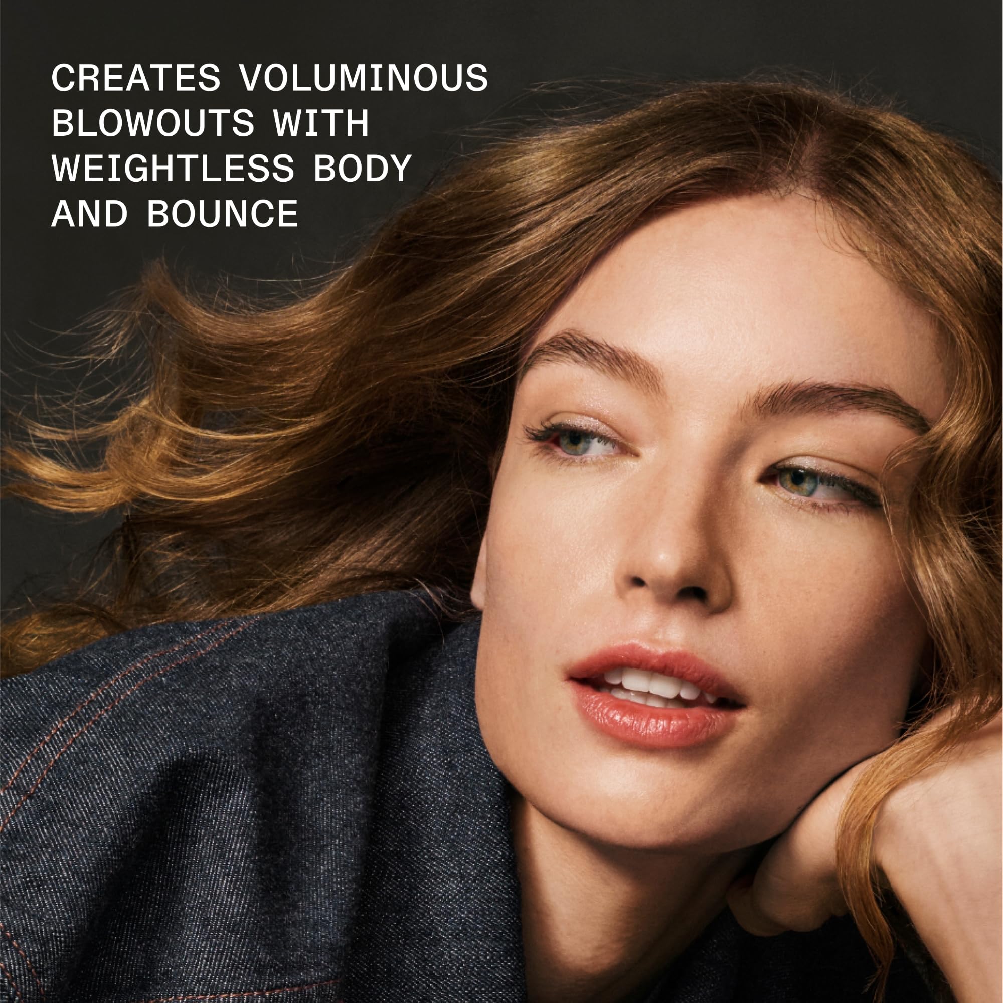 Olaplex Volumizing Blow Dry Mist on wet hair highlights faster blow-dry and smoothness.