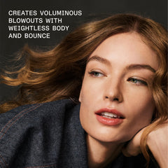 Olaplex Volumizing Blow Dry Mist on wet hair highlights faster blow-dry and smoothness.