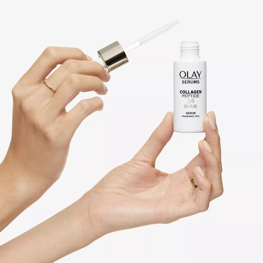Olay Collagen Peptide Serum MAX being smoothed on the face and neck for even application.