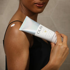 Olay lotion tube back shows 3-pack value and ingredients for daily moisture.