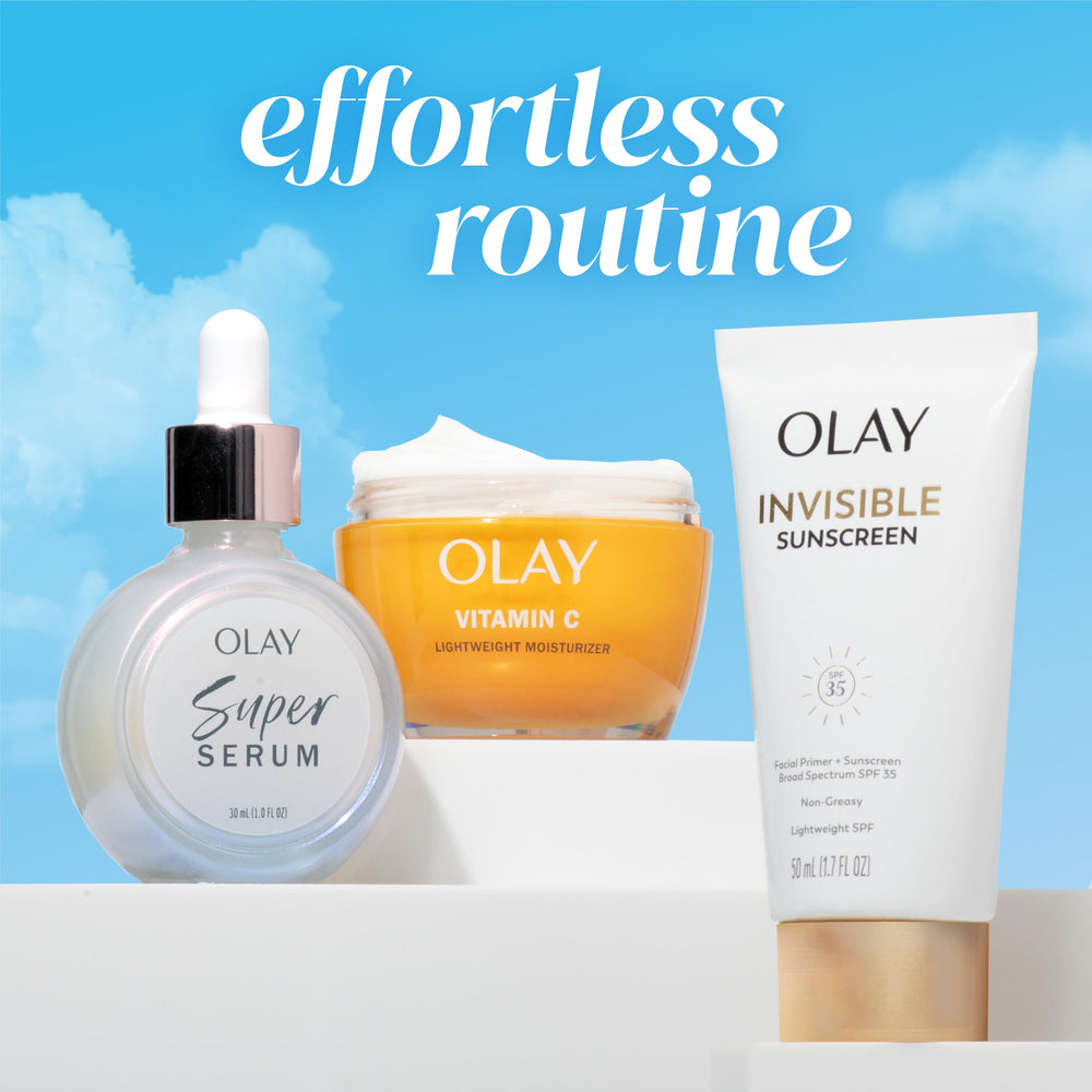 Olay Invisible Sunscreen fragrance-free bottle shown on vanity for daily protection.