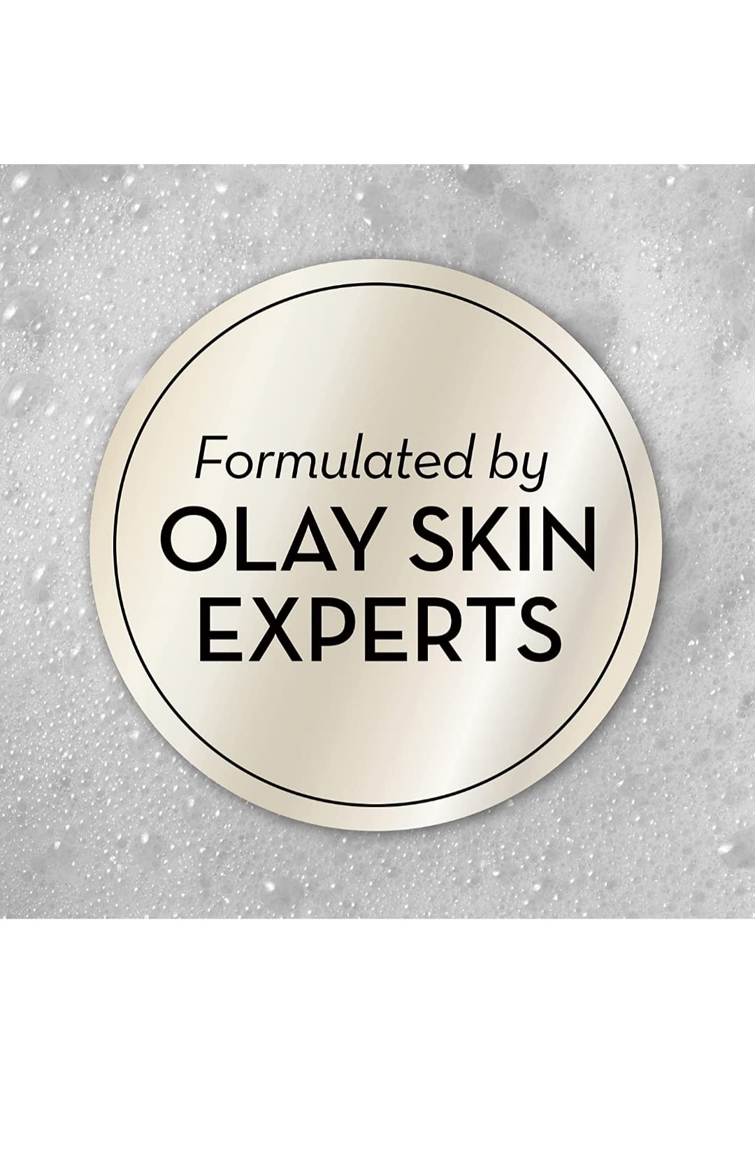 Close-up of Olay Moisture Outlast beauty bar lather—creamy moisture in action