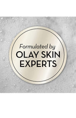 Close-up of Olay Moisture Outlast beauty bar lather—creamy moisture in action