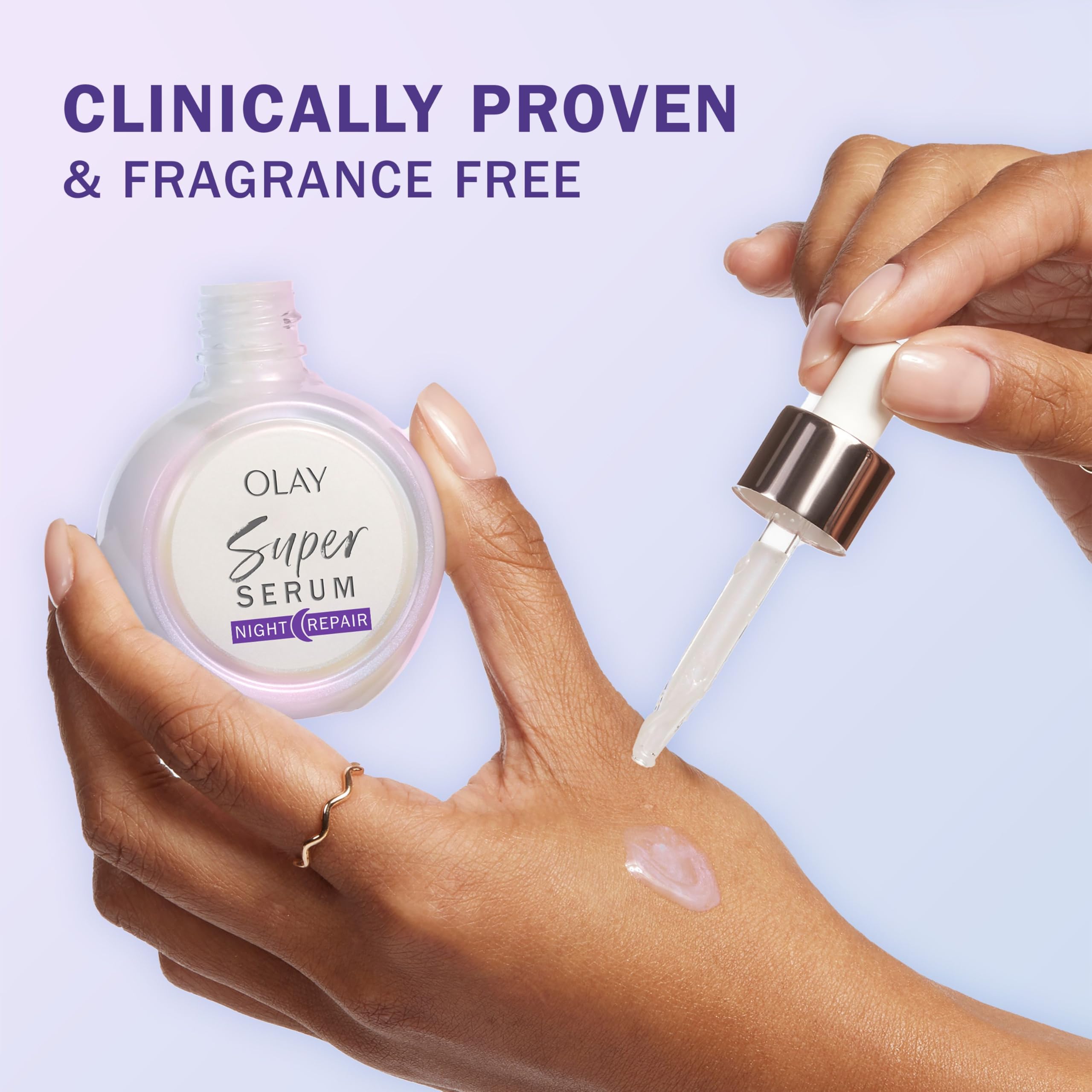 Olay Super Serum Night Repair Fragrance Free night routine shot shows applying cream