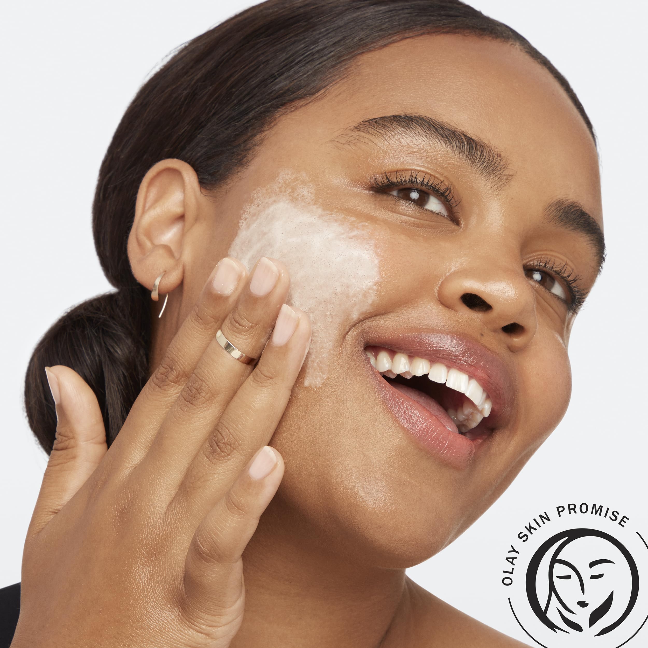 Olay Total Effects Citrus scrub texture closeup shows gentle exfoliation for polished skin.
