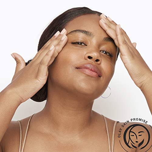 Olay Total Effects Night Firming Cream on cheek illustrates gentle brightness and smoothing effect.