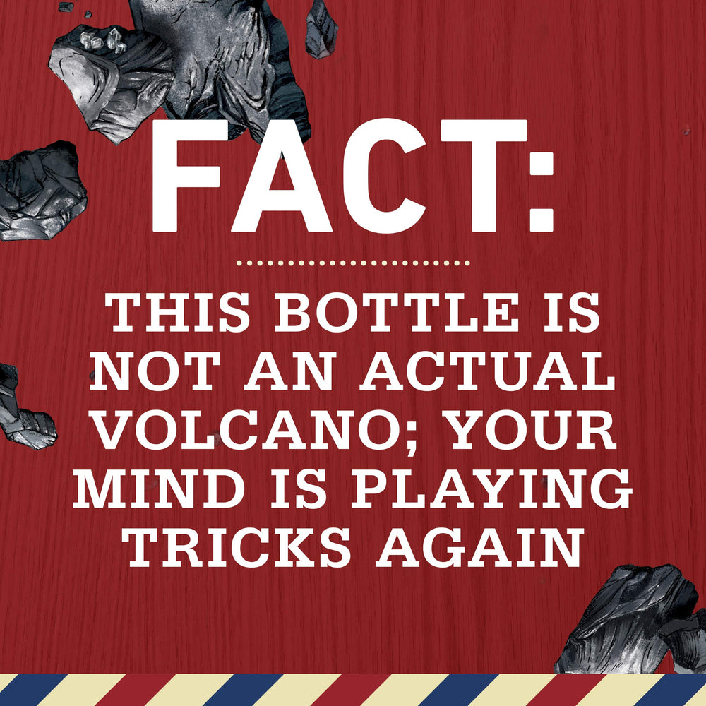 Old Spice Volcano Charcoal Shampoo charcoal-detail image emphasizes purifying ingredient and fresh finish