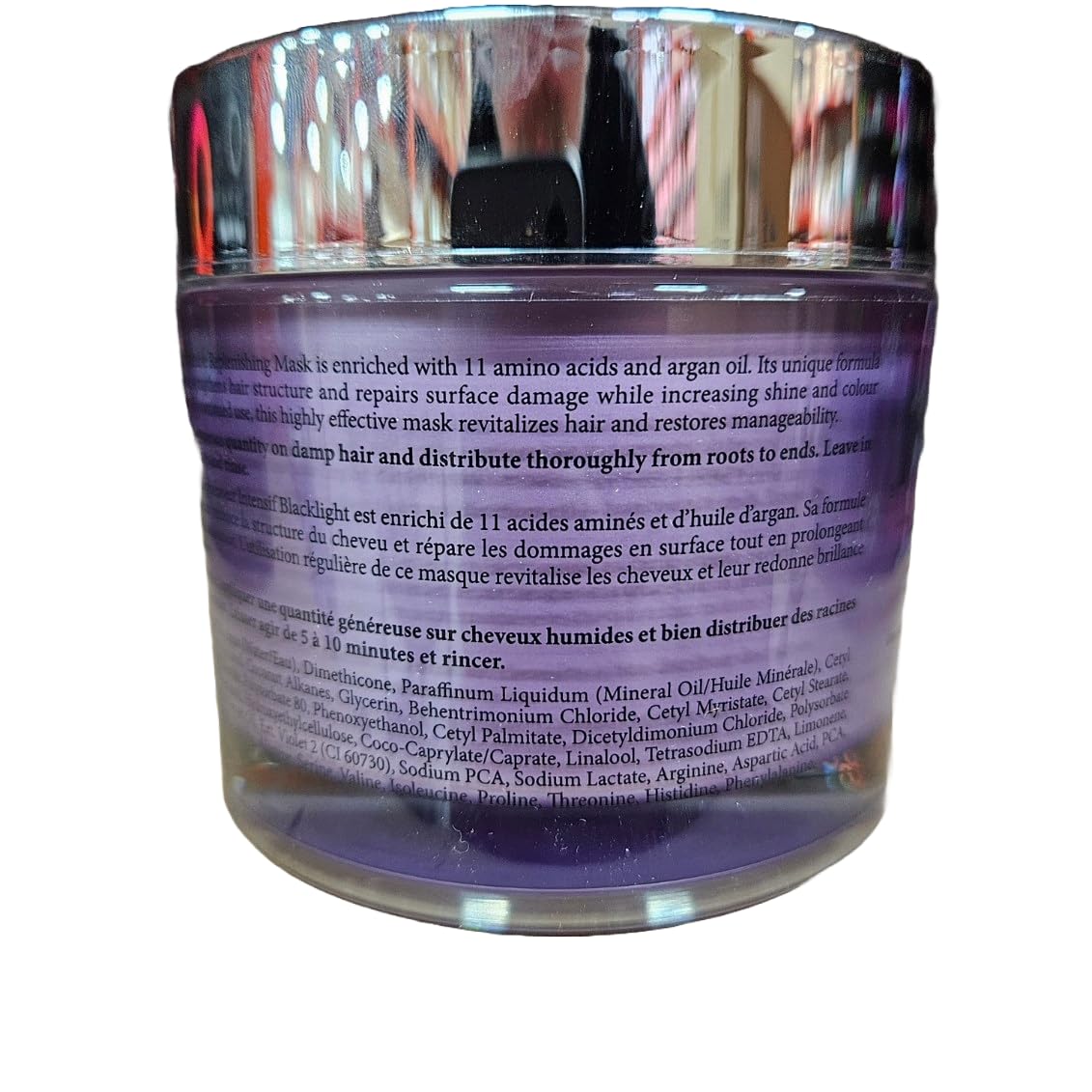 Oligo Professionnel Blacklight mask on dry hair highlights hydration and surface-damage repair.