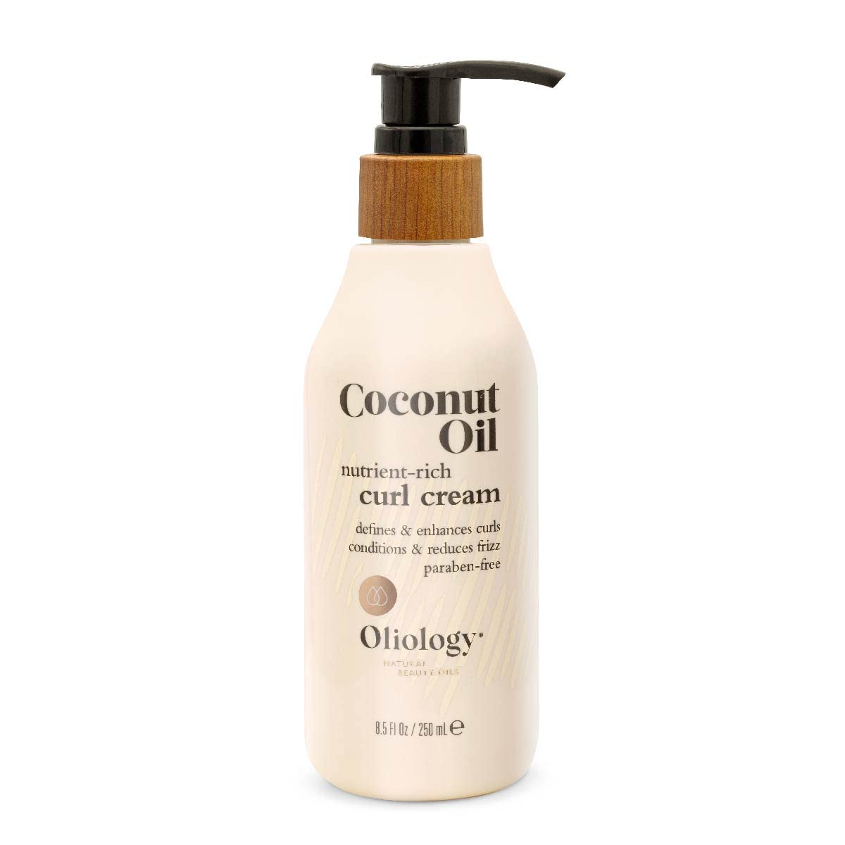 Oliology Coconut Oil Curl Cream bottle on vanity emphasizes paraben free, cruelty free styling.