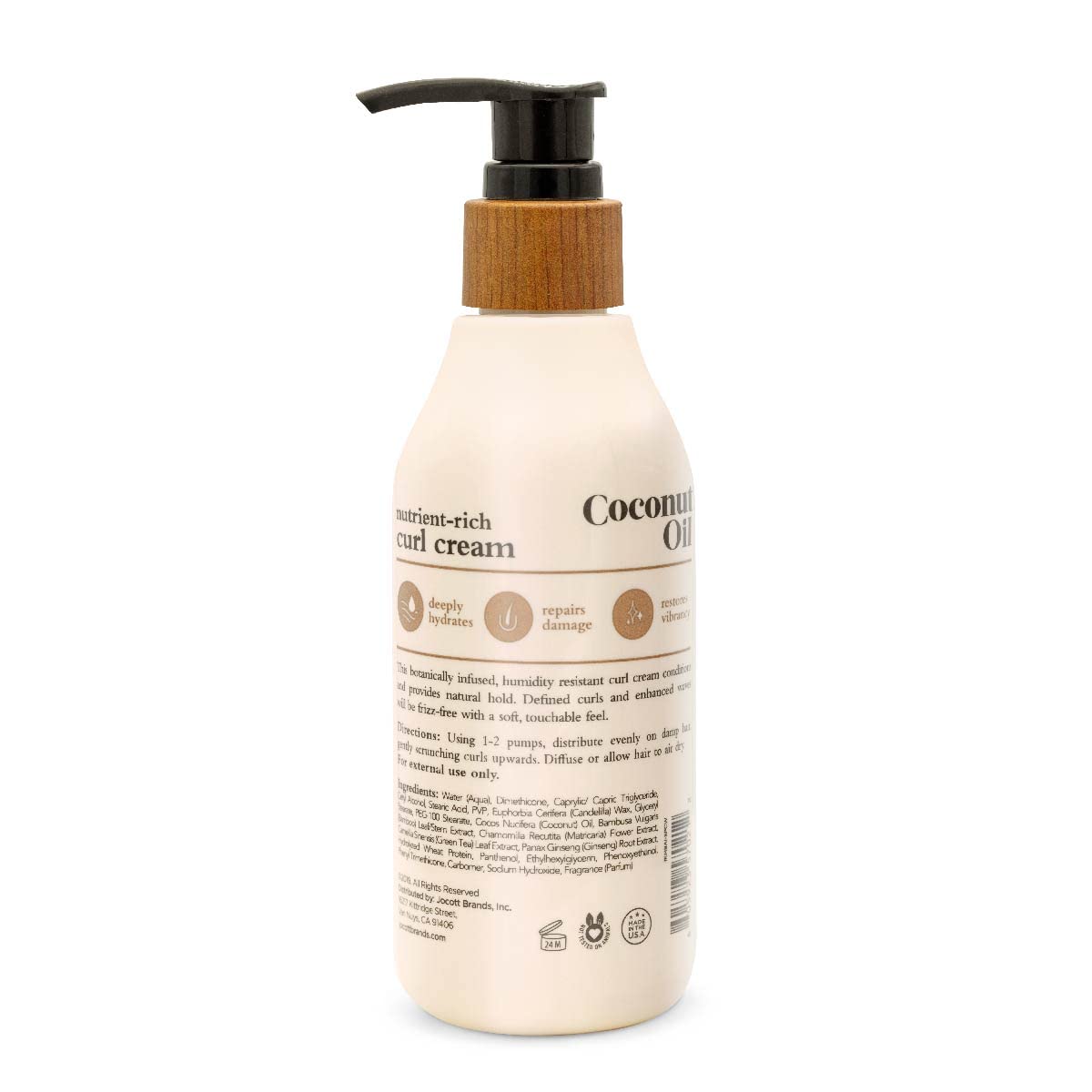 Oliology curl cream applied to damp hair for detangling and frizz control.
