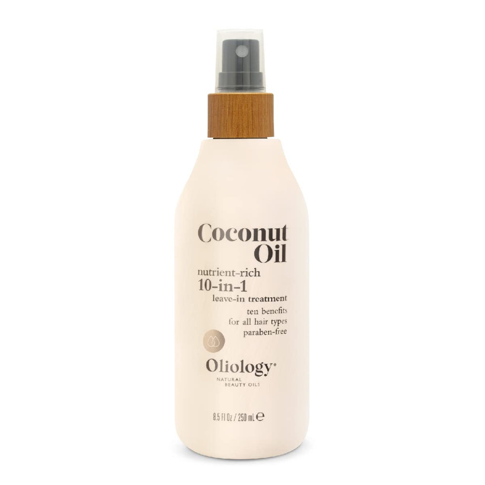 Oliology spray on damp scalp for hydration and shine across textures.