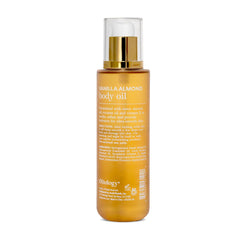 Oliology Vanilla Almond Body Oil being applied to skin for quick absorption and softness