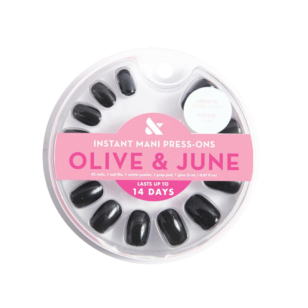 Olive & June Instant Mani glue bottle and nails ready for at-home salon-quality results.