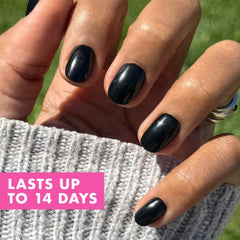 Olive & June Instant Mani on hand demonstrating natural curve for realistic look.
