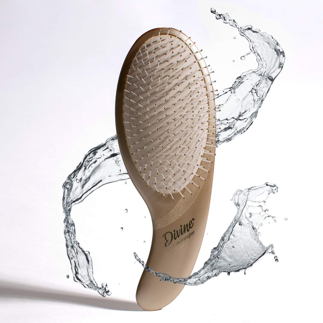 Olivia Garden Divine brush in use during styling for precise control and flow.