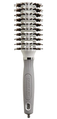 Olivia Garden Ceramic+Ion Turbo Vent Pro brush closeup highlights heat retention for faster styling.