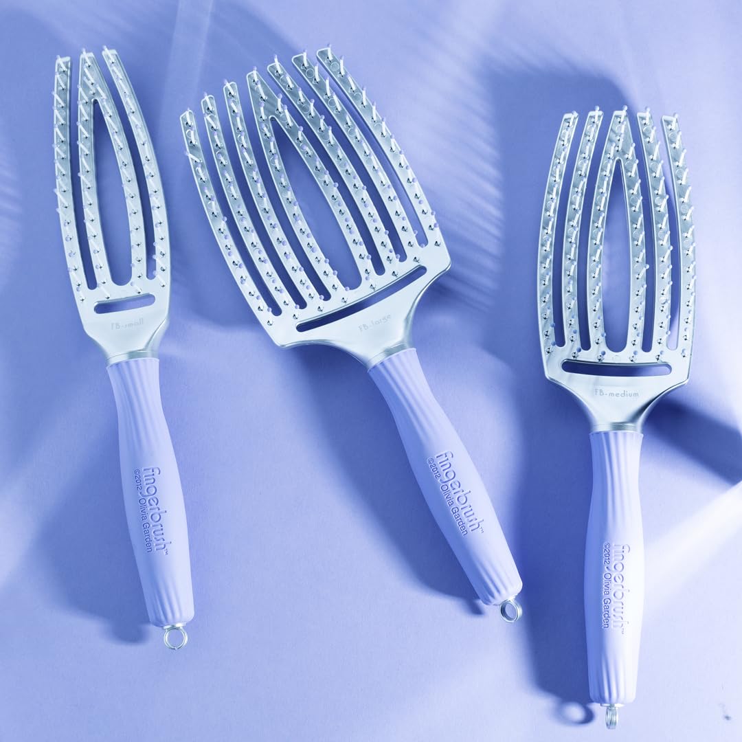 Olivia Garden finger brush small ergonomic handle enhances daily brushing routine.