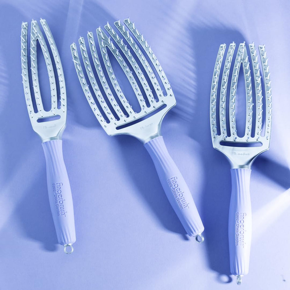 Olivia Garden finger brush small ergonomic handle enhances daily brushing routine.