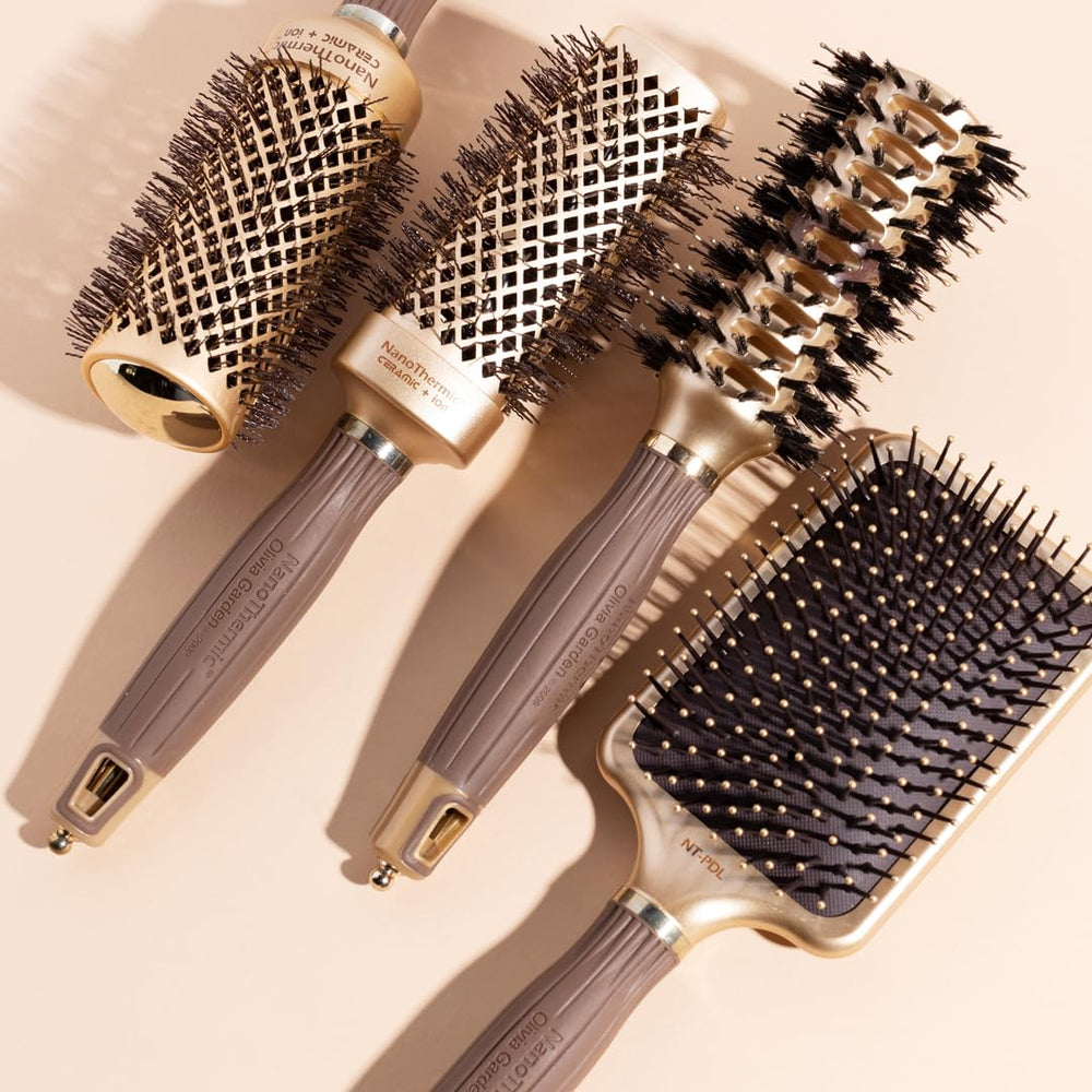 Olivia Garden NanoThermic NT-PDL in use demonstrating detangling and styling in one pass
