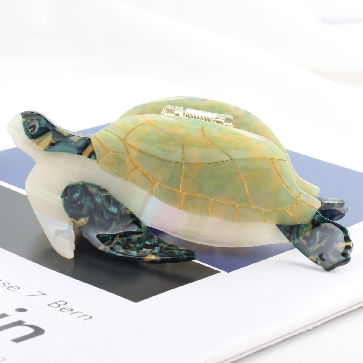 OMG Decor water-use friendly hair clip for bath routines in green.