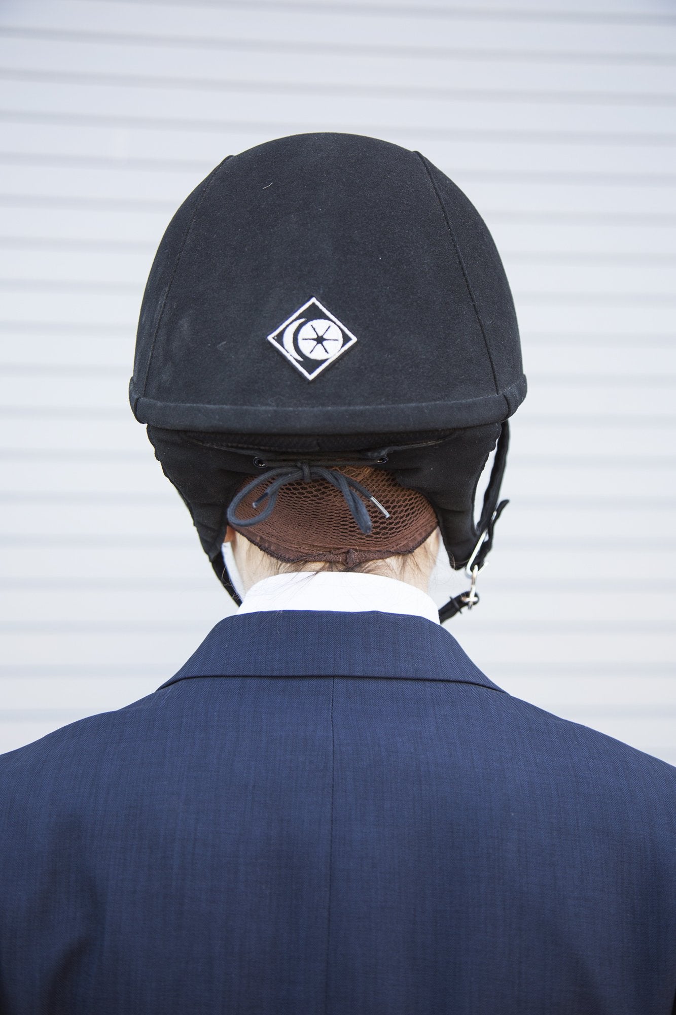 One Knot Hairnet in Medium Brown blends with many hair colors for discreet coverage.