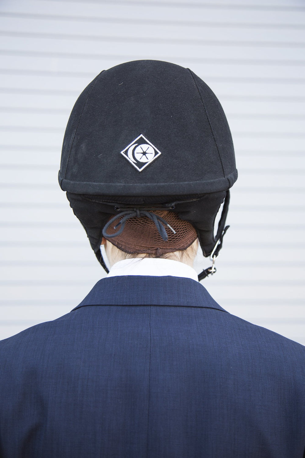 One Knot Hairnet in Medium Brown blends with many hair colors for discreet coverage.